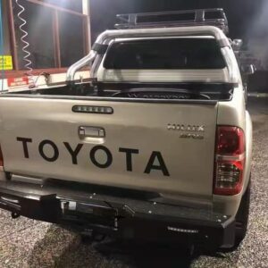 BUMPER TRASERO TOYOTA HILUX REVO 2016+